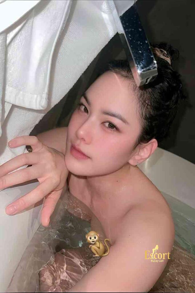 Escort Malay Girl Lainey, 23, a Thai escort in Kuala Lumpur, relaxing in a bathtub. KL Escort Girl Service