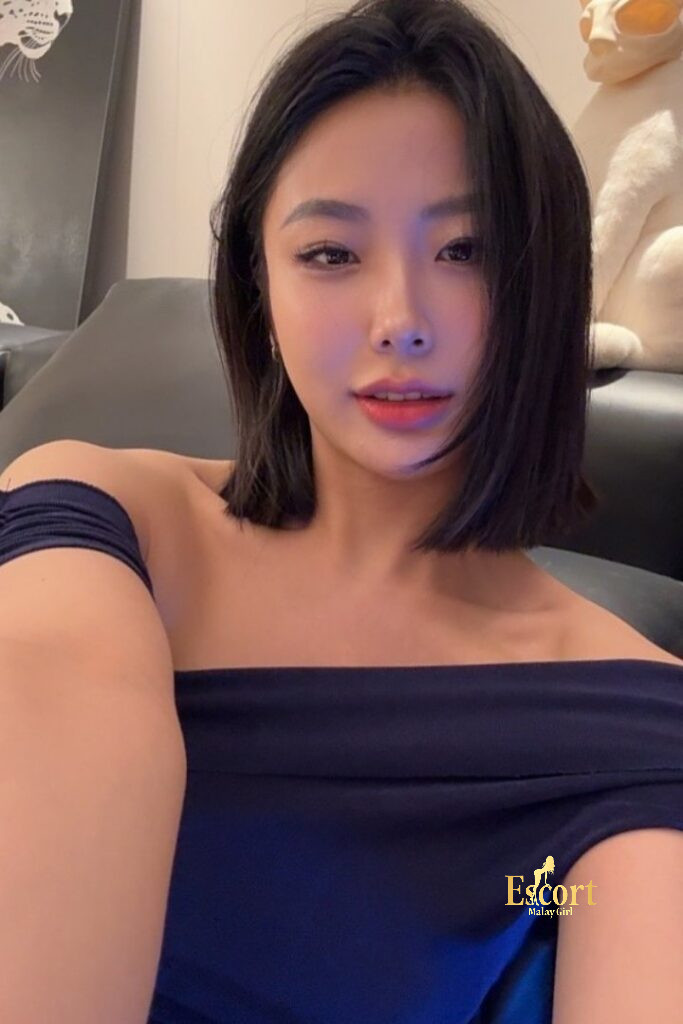Escort Malay Girl Chinese escort Ling An, 23yo, C cup, posing in blue dress KL Escort Girl Service