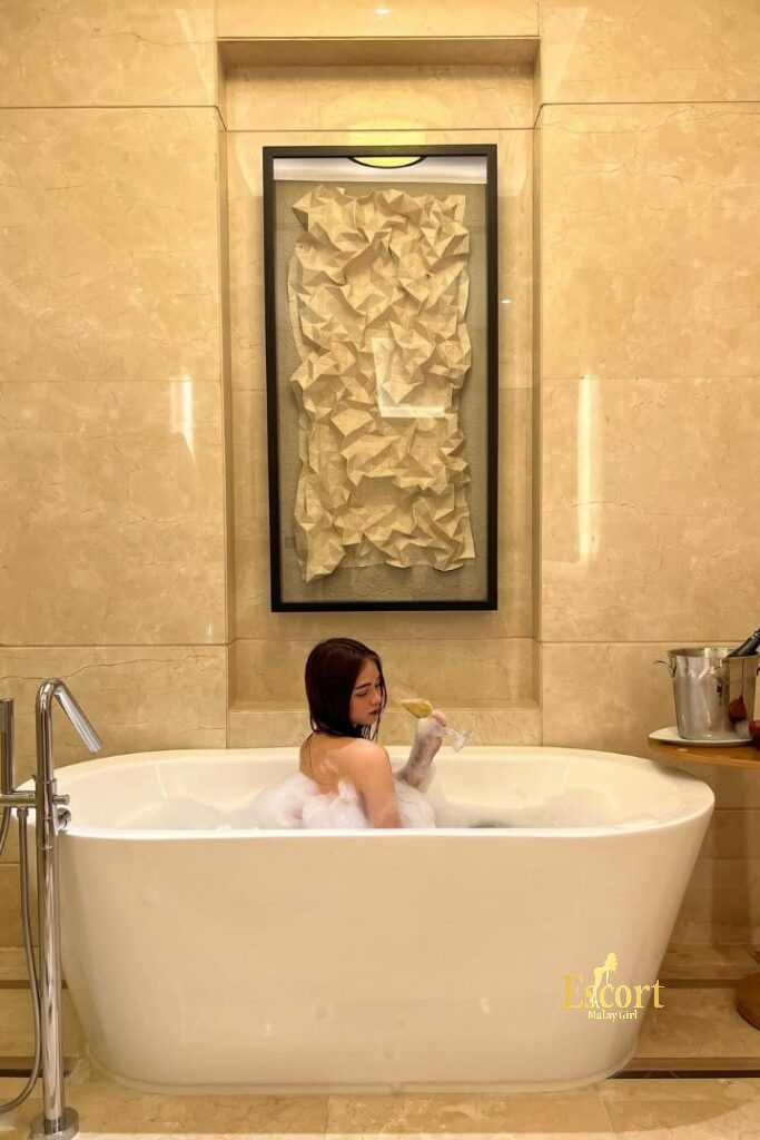 Escort Malay Girl Malay Escort Zanis in bathtub with wine, modern bathroom KL Escort Girl Service